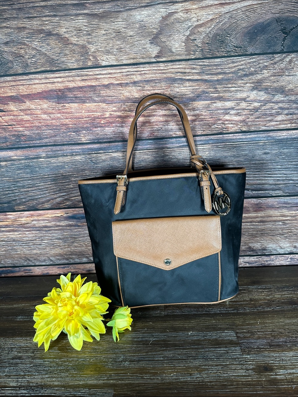 Michael Kors Jet Set Nylon Large Pocket tote bag in black with brown leather